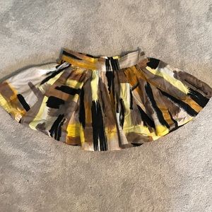 Cute patterned gold, yellow, tan, black, brown, beige skirt 👌